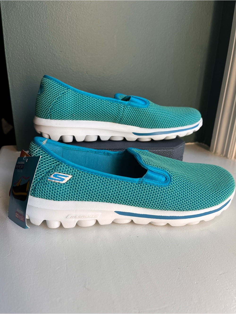 Skechers Women's Slip-On Sneakers in Teal and White